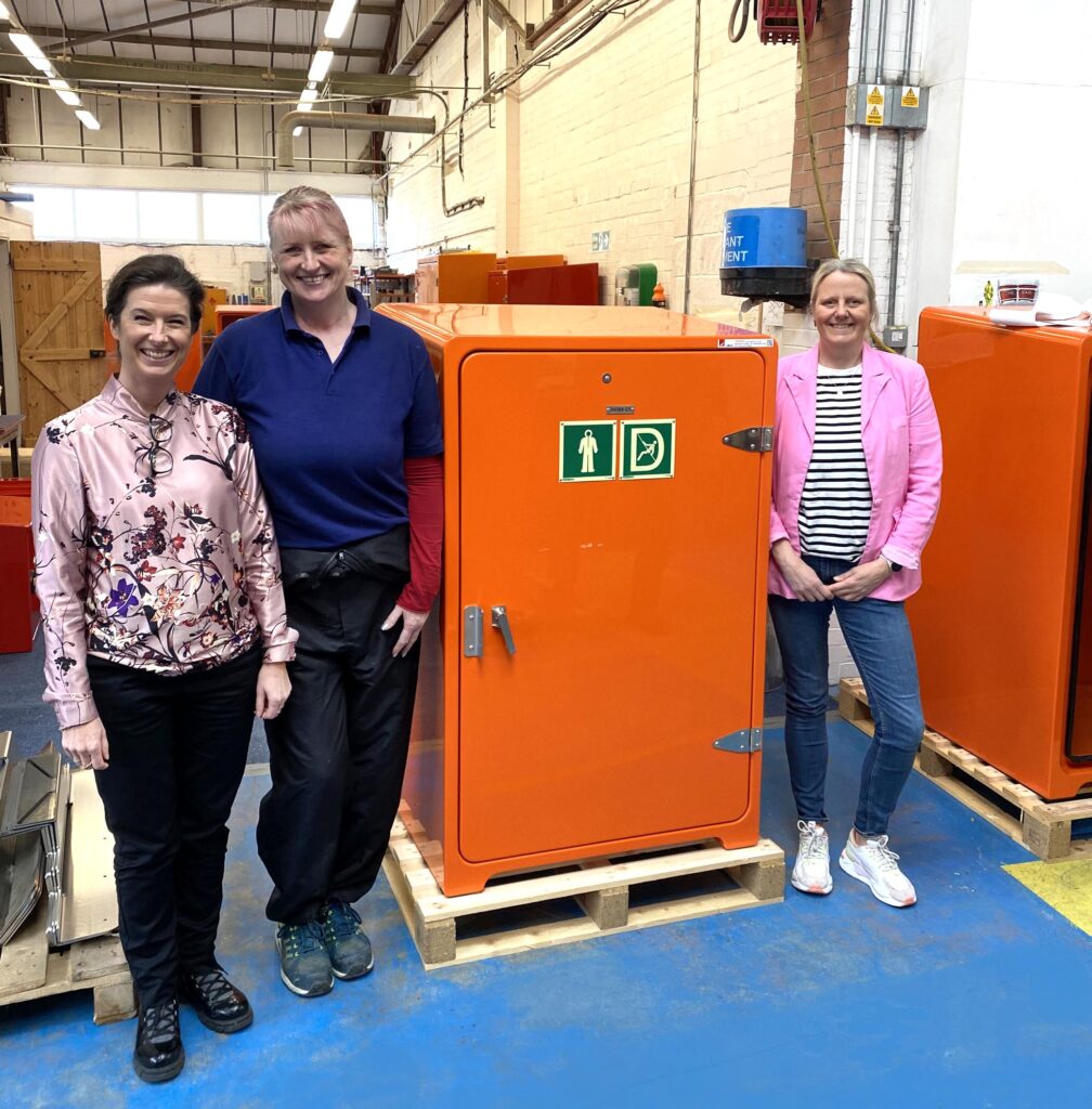 Bettina Kjaersgaard, Sarah from Jo Bird and Camilla Holmegaard Carstensen pose with JB29 Wind turbine safety equipment cabinets.