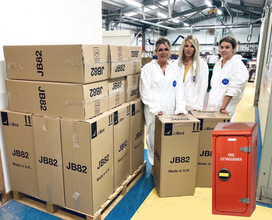 Three of the Jo Bird production team with the last batch of JB82 fire extinguisher cabinets destined for Kazakhstan