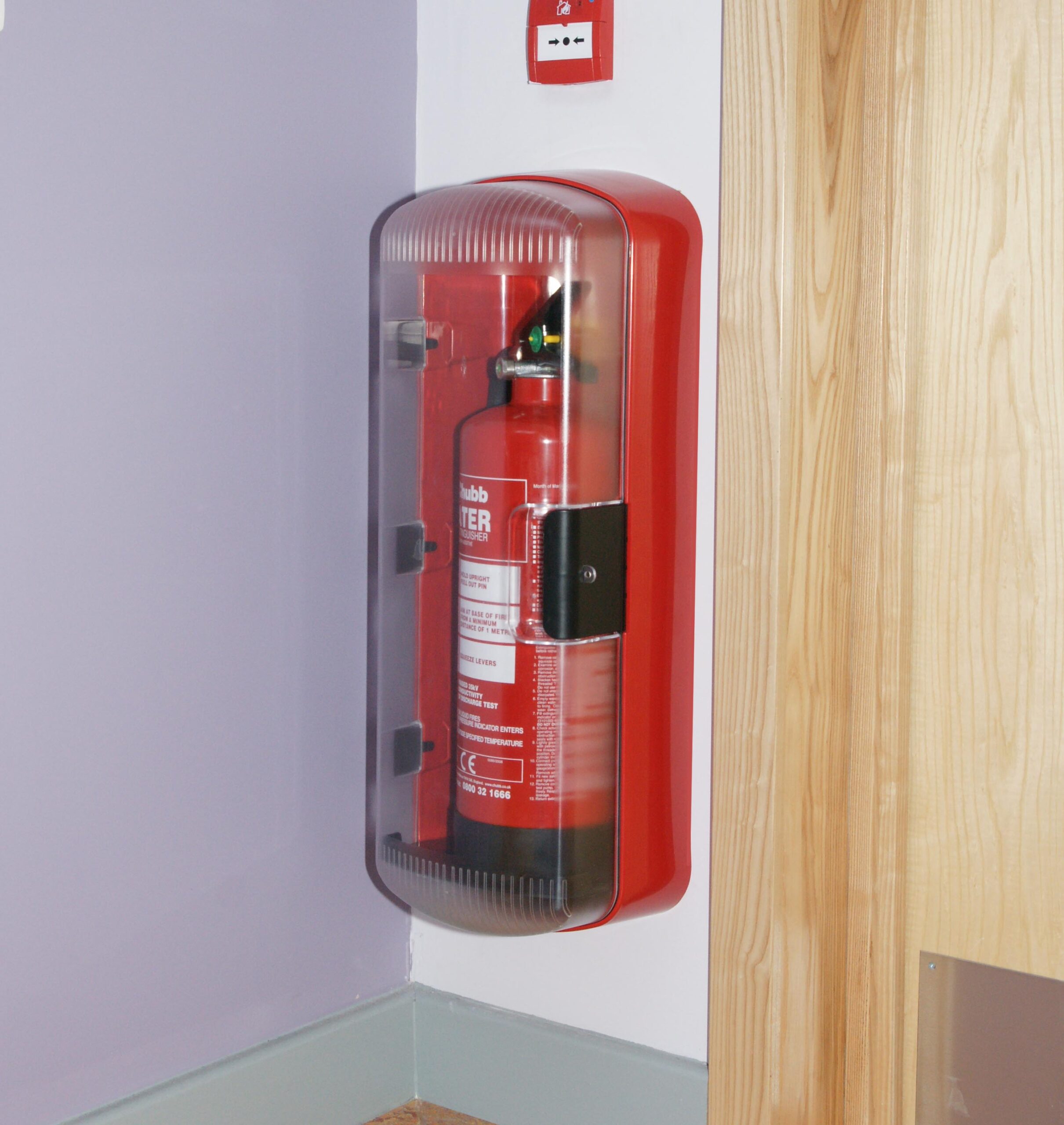 SOS101 fire extinguisher cabinet in a school